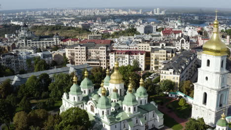 saint sophia cathedral with cityscape in background in kiev, ukraine - aerial drone shot