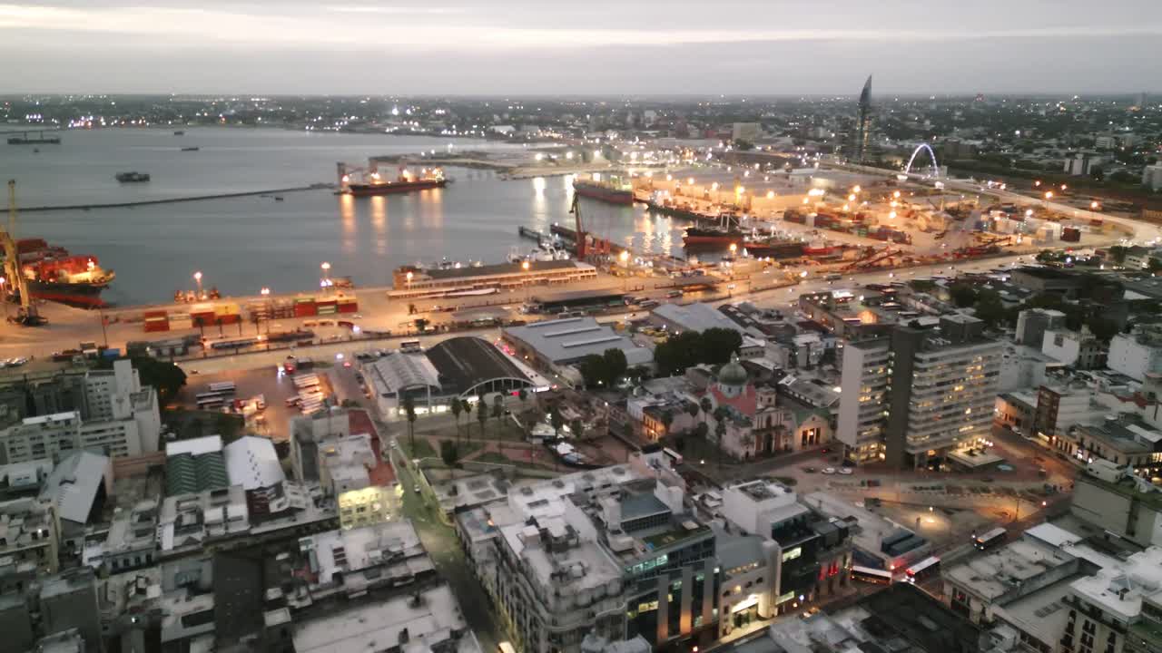 aerial of port harbour commercial cargo boat in Montevideo Uruguay illuminated at night