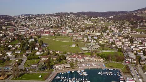 drone view of pully and its port on lake geneva