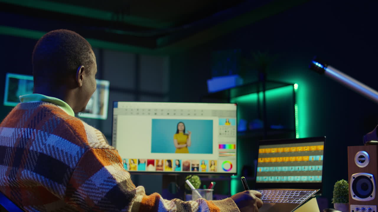 Man using photo editing software on computer