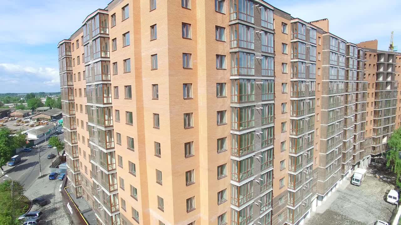Modern Town Houses On Urban Street. Aerial shot of the modern town houses of brick and glass on urban street