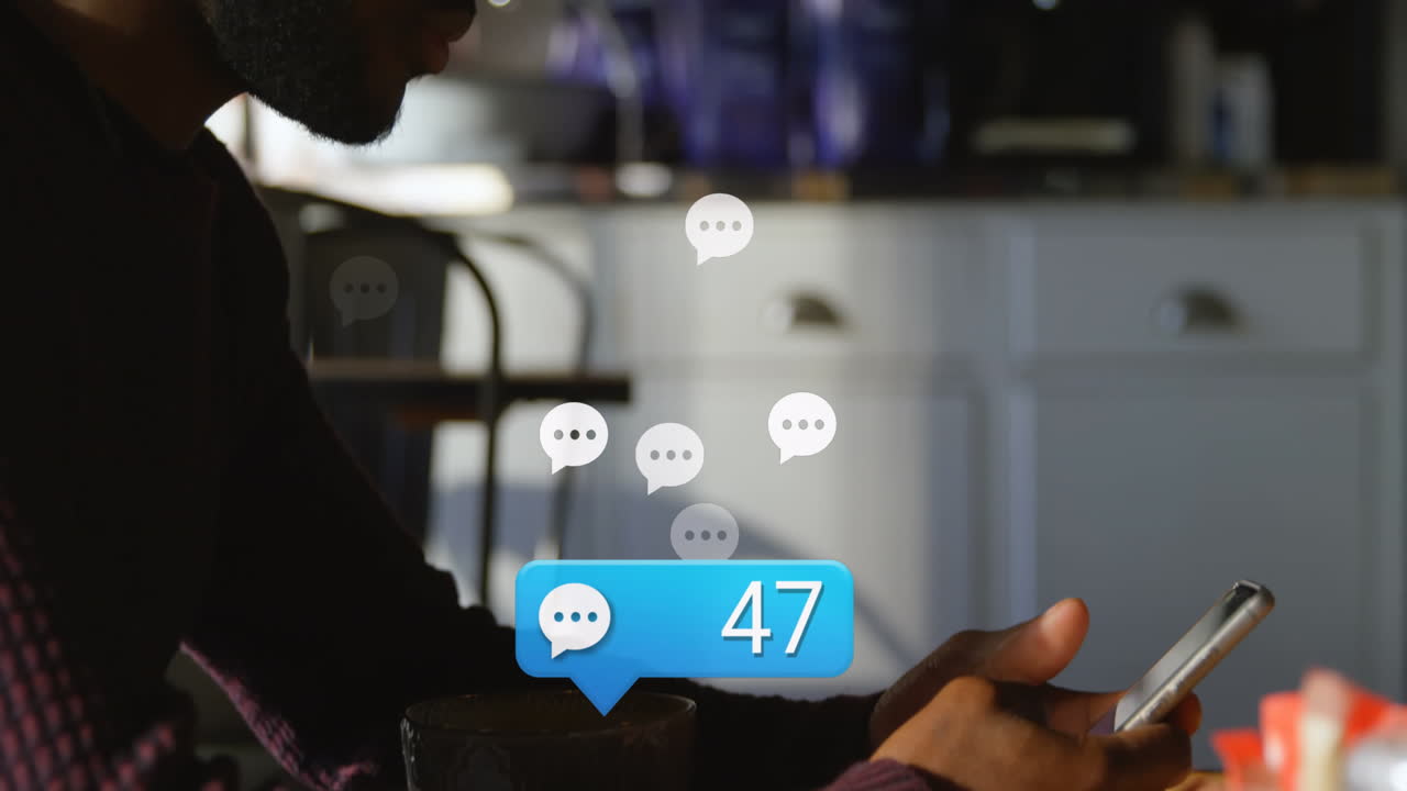 animación de iconos de los medios sobre un hombre biracial usando un teléfono inteligente