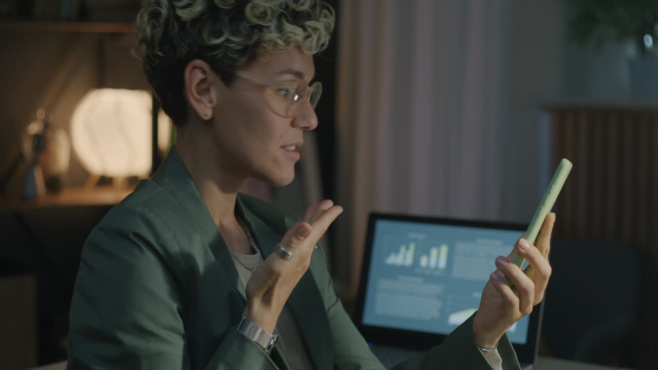 Woman having a video call in home office