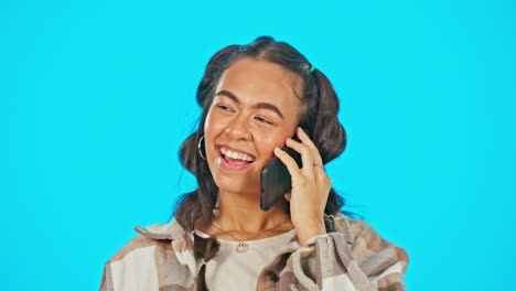 phone call, laughing and woman isolated on blue