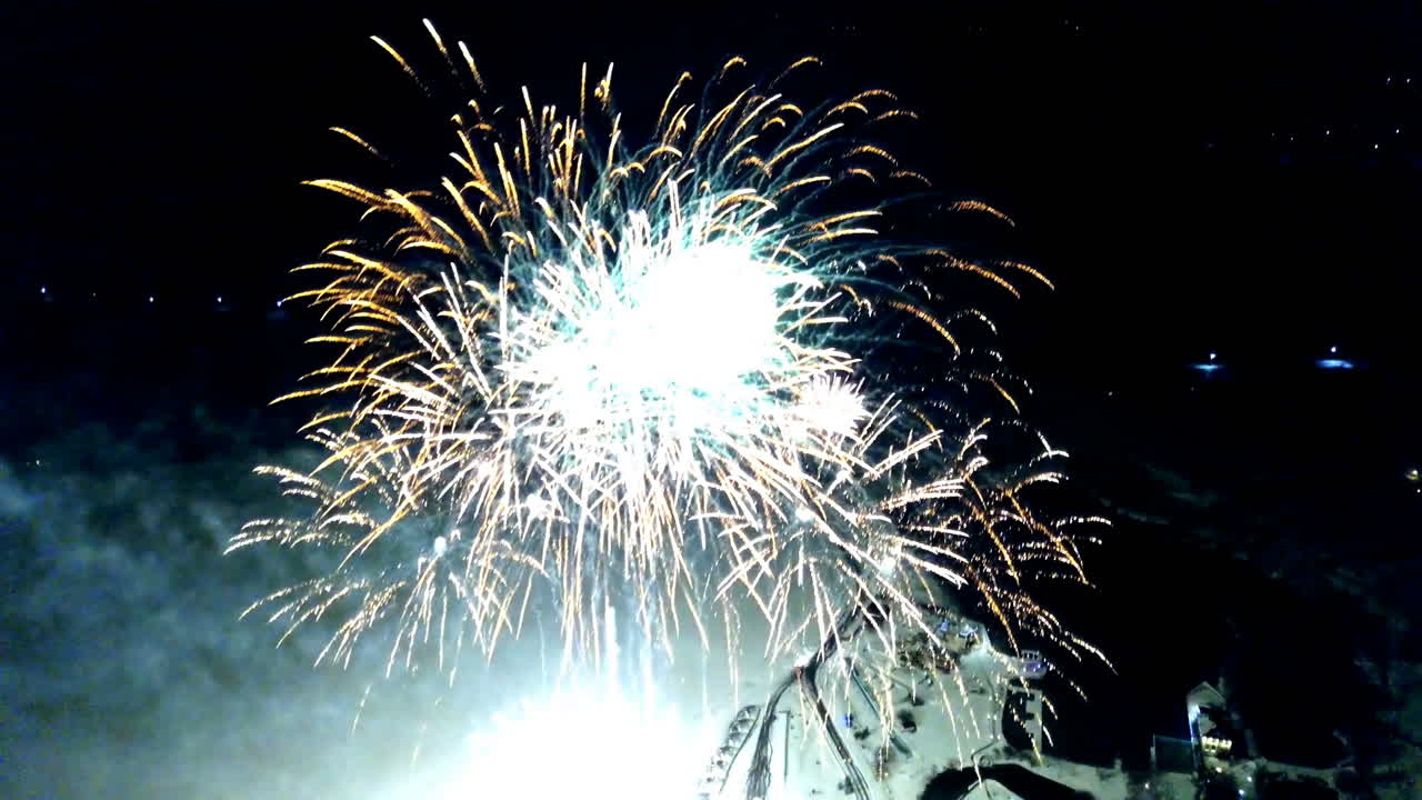 Festive fireworks display. Magical winter evening. Aerial view