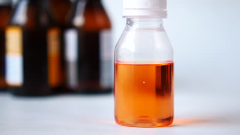 orange liquid medicine bottle