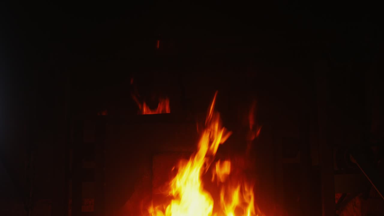 Fire in Fireplace at Night