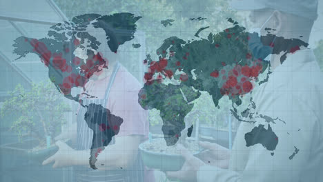 animation of world map and covid 19 locations over men in garden in face masks