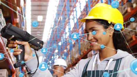 Animation-of-networks-of-connections-with-icons-over-woman-working-in-warehouse