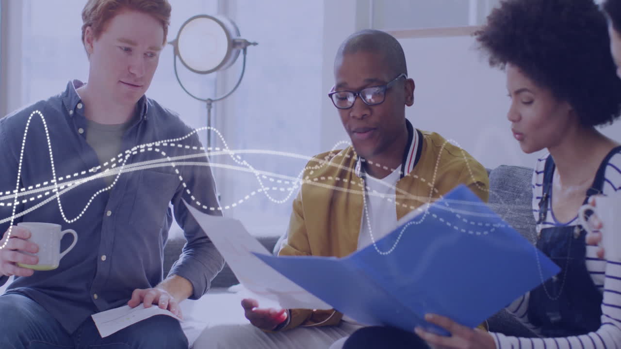 Animation of financial data processing over diverse business people working together in office