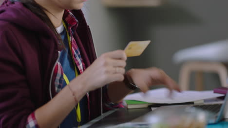 close up happy caucasian woman student shopping online banking using laptop computer spending money enjoying credit card purchase satisfaction smiling listening to music in modern startup office