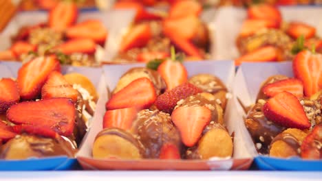 close up of freshly made strawberries and chocolate dessert