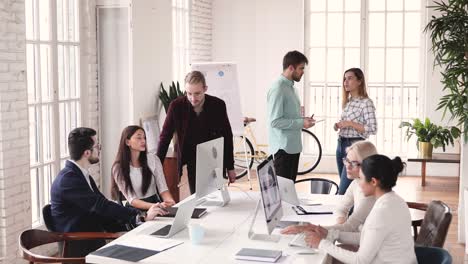 happy mixed race employees involved in daily working routine.
