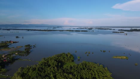 aerial view of rural flooded area submerged in flood water in bangladesh, sylhet