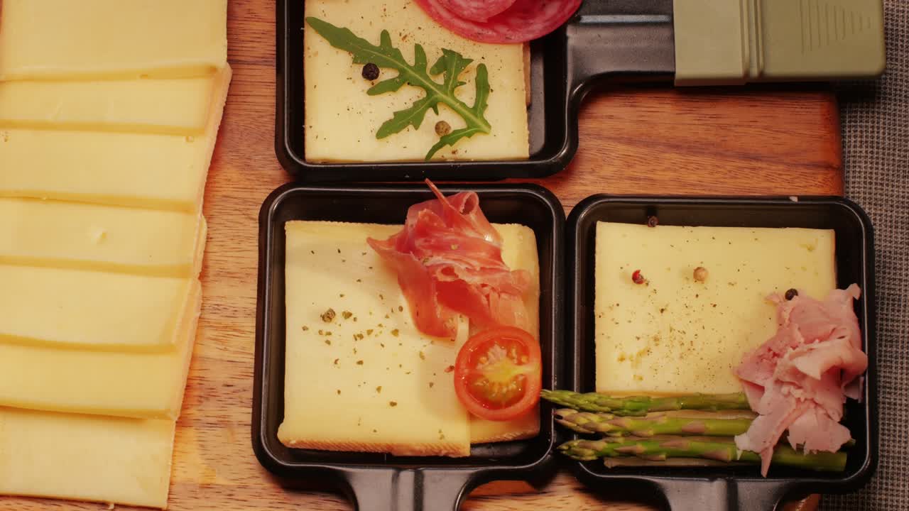 Italian or Spanish restaurant with traditional tapas food, Spanish cuisine, delicious tapas and cheese plate, bruschetta with cheese, olives dry tomatoes and tasty sandwich bar appetizer, buffet