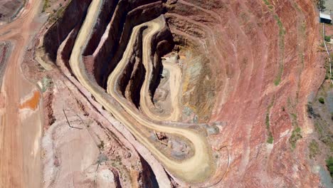 Aerial-drone-shot-of-mining-town-open-cut-mine-copper-ore-Fort-Bourke-Hill-Lookout-Cobar-outback-NSW-Australia-4K