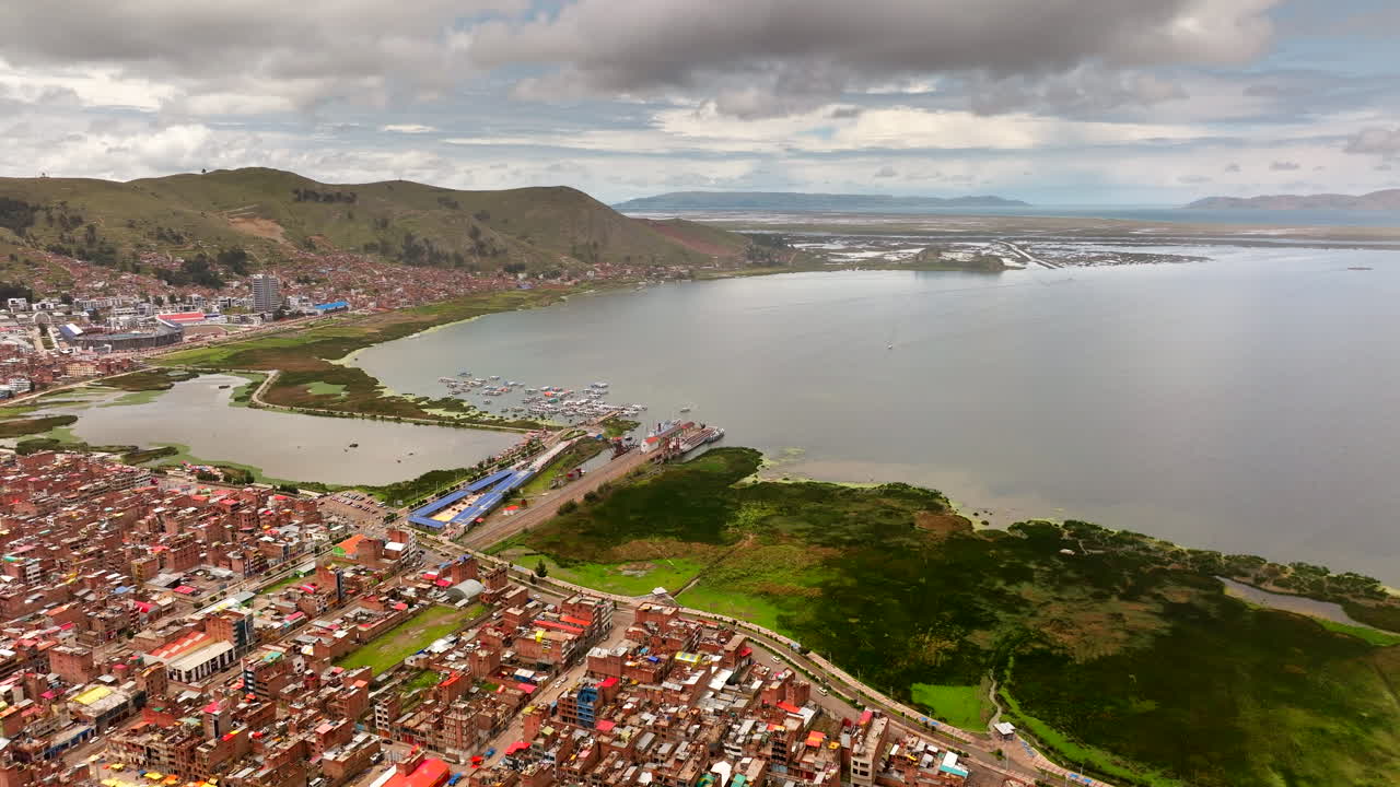 Puno city on shore of Lake Titicaca in Peru the birthplace of Inca Empire