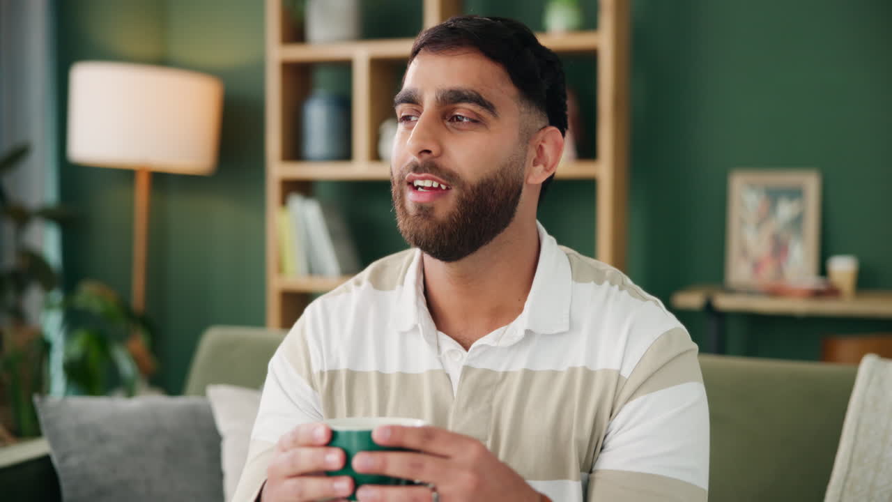 Man enjoying a cup of tea at home