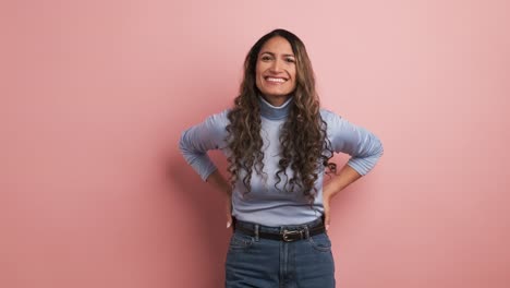 happy hispanic woman smiling at the camera