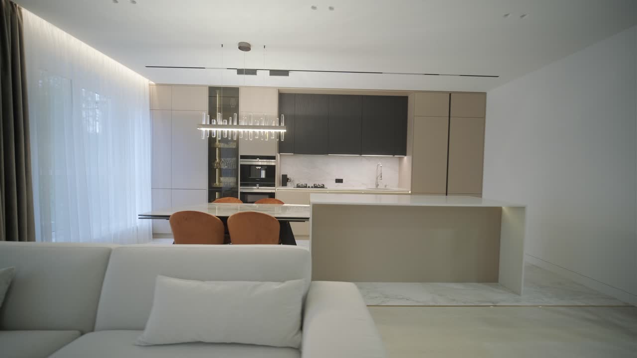 Elegant Open Plan Kitchen and Dining Area | Premium Stock Video Footage