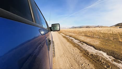 Driving-along-the-Pony-Express-trail-in-the-west-desert-of-Utah-as-viewed-from-the-side-of-a-truck---hyper-lapse