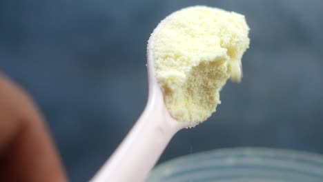 baby formula in a spoon