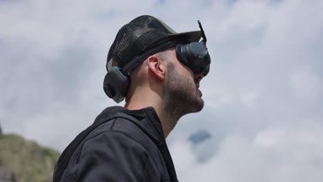 drone pilot outdoor wearing dji avata 2 fpv goggles. closeup shot