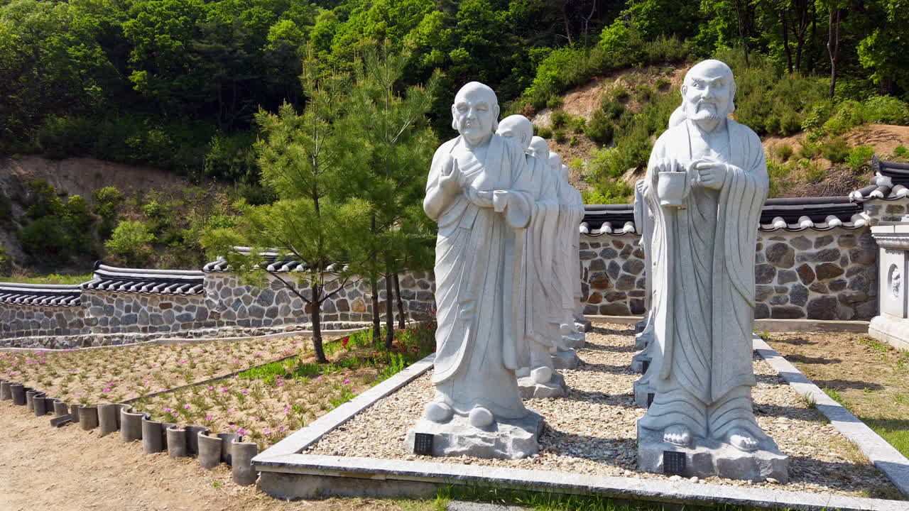 Stone Statues in a Garden