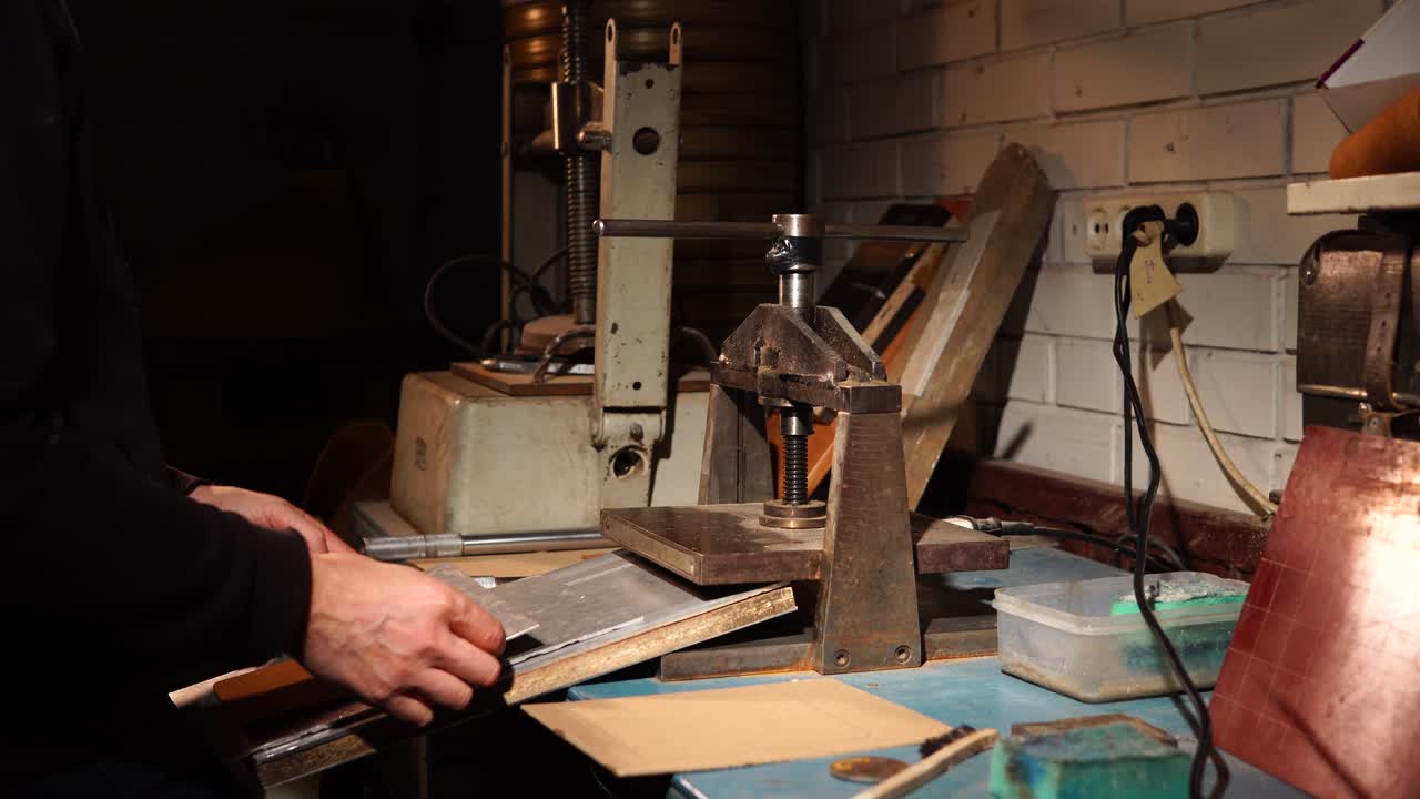 Leather Craftsman at Work in a Workshop
