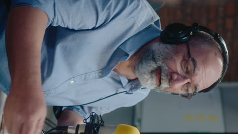 man recording a podcast