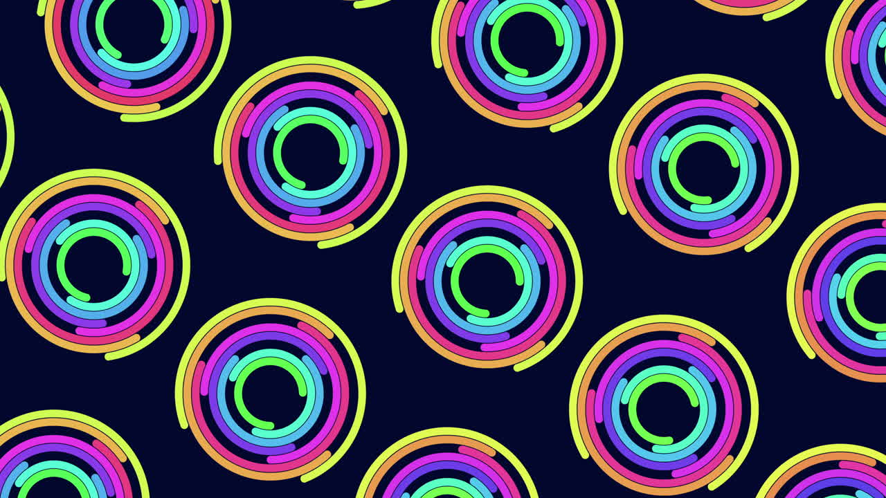 Dazzling spiral of colorful circles on a black background