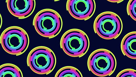 Dazzling-spiral-of-colorful-circles-on-a-black-background