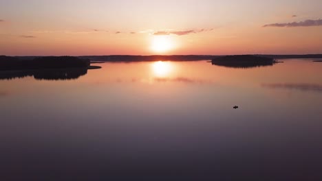 sunset over lake aerial. slow sideways move