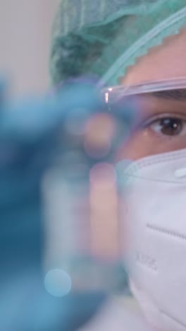 closeup of doctor presenting a covid19 vaccine during a vaccination session