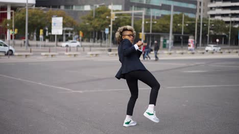 portrait of business african american girl in fighting pose. hard business concept