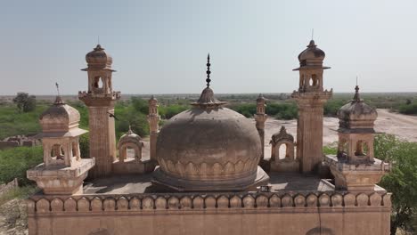 drone-shot aerial footage of derawar fort in a cinematic setting