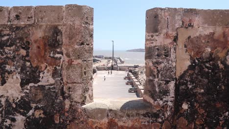 sqala building in essaouira, morocco, is a historic structure with a square shape, thick stone walls, and decorative elements