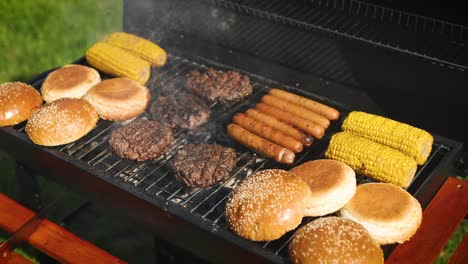 Mixed-american-barbecue-food-on-hot-grill