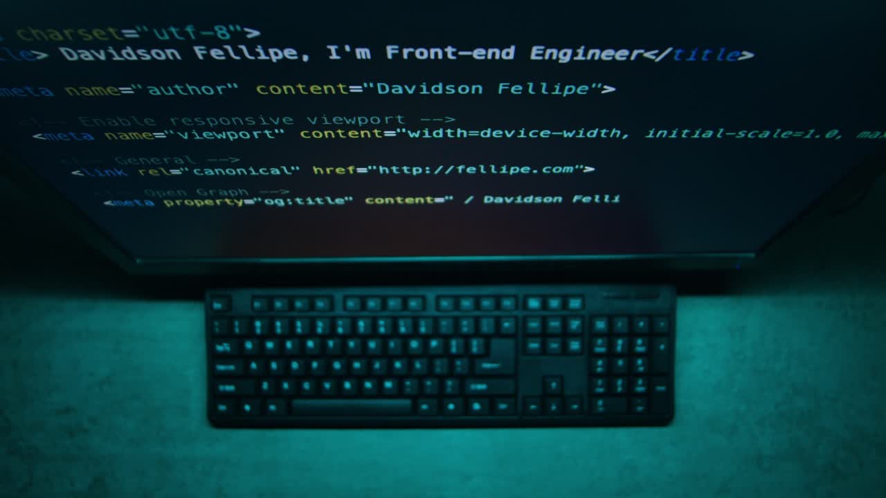 Computer Screen with Code and Keyboard
