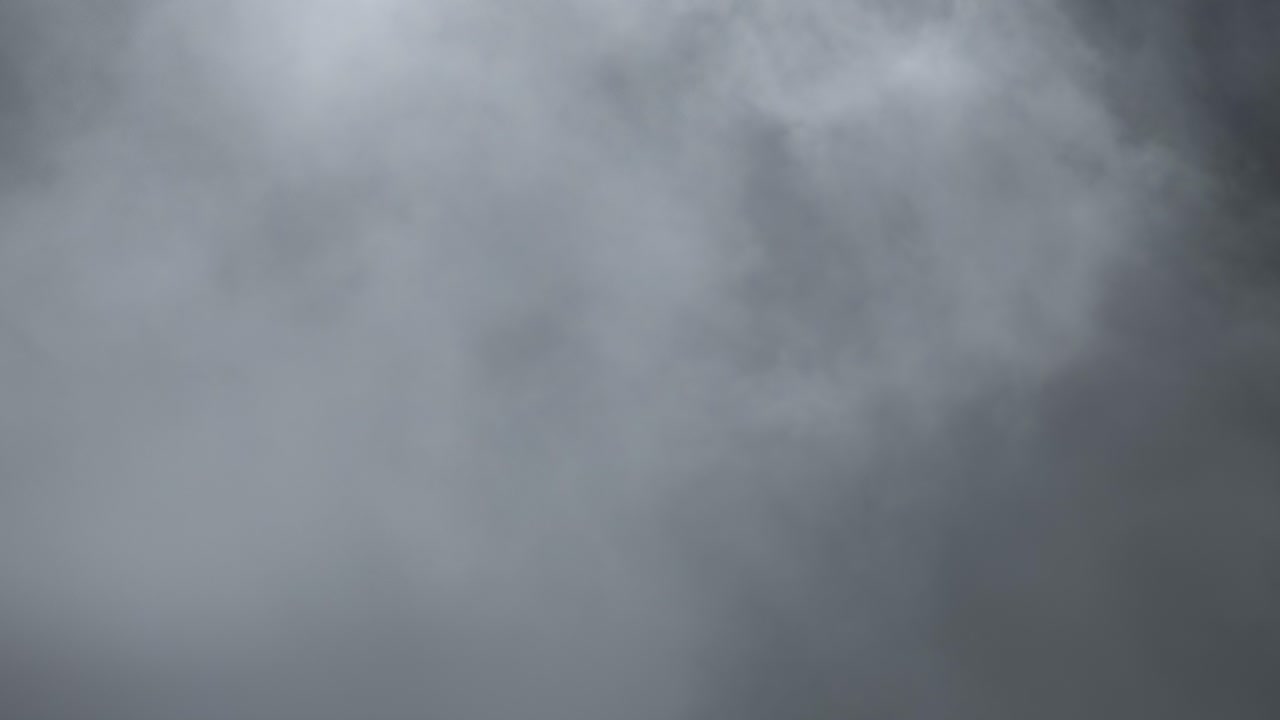 Professional 4K slow-motion VFX background of Halloween smoke and dense fog, an artistic spooky element for horror intros, eerie overlays, and cinematic visual storytelling projects