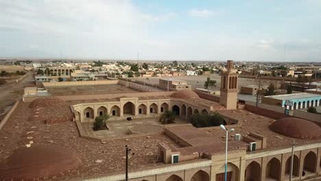 Sunset-in-caravansary-in-desert-climate-city-with-mud-brick-adobe-houses-in-yazd-aqda-use-for-rest-stop-for-post-men-in-ancient-historical-time-down-town-old-city-of-ardakan