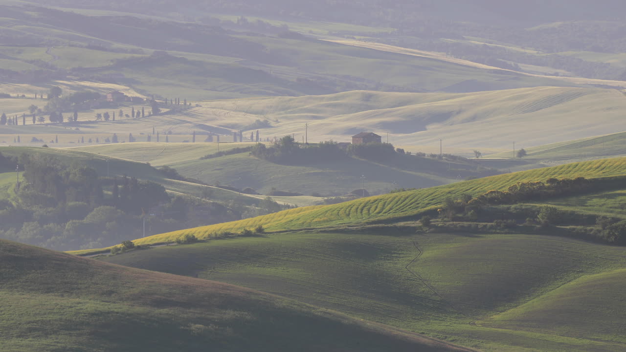 A lone farmhouse in the Val d'Orcia in Tuscany, Italy