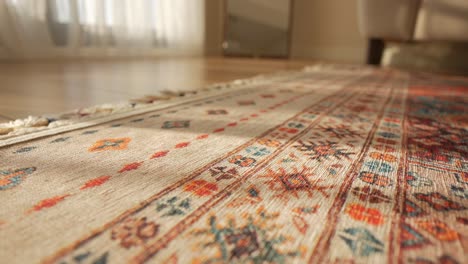 close-up view of an ornate beige rug
