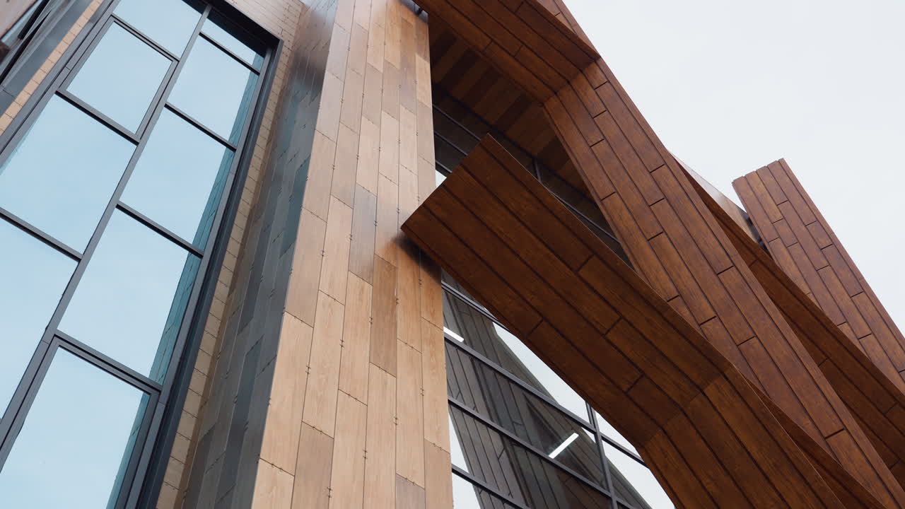 Close up view of fitness center facade featuring modern wooden structural decoration and tiled wall cladding against overcast sky, showcasing stylish exterior architecture and outdoor design elements
