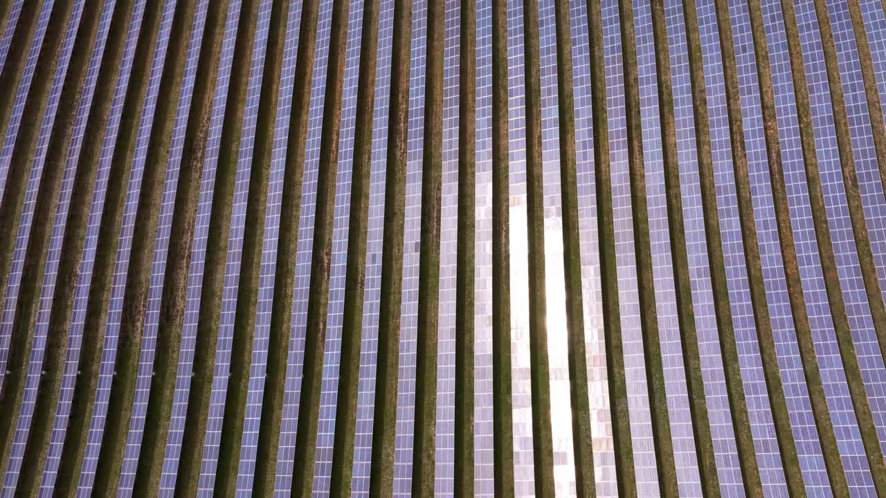 Aerial view of renewable solar station in French countryside at daylight