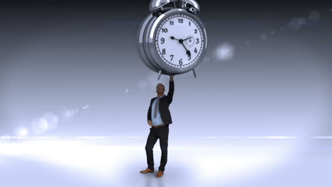 Businessman-holding-giant-alarm-clock-