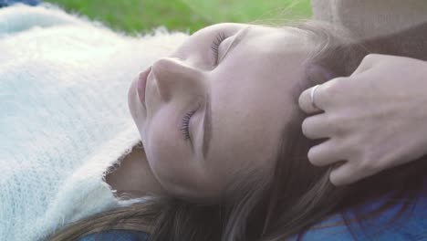 mother and daughter resting in the park