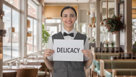 happy indian woman waiter holding delicacy banner