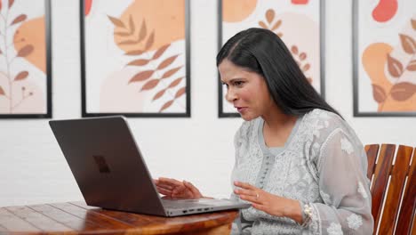 Indian-female-boss-on-video-call-meeting