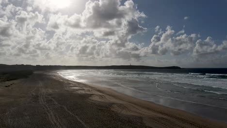 Aerial-drone-elevation-of-Valdoviño-beach-with-a-cloudy-background